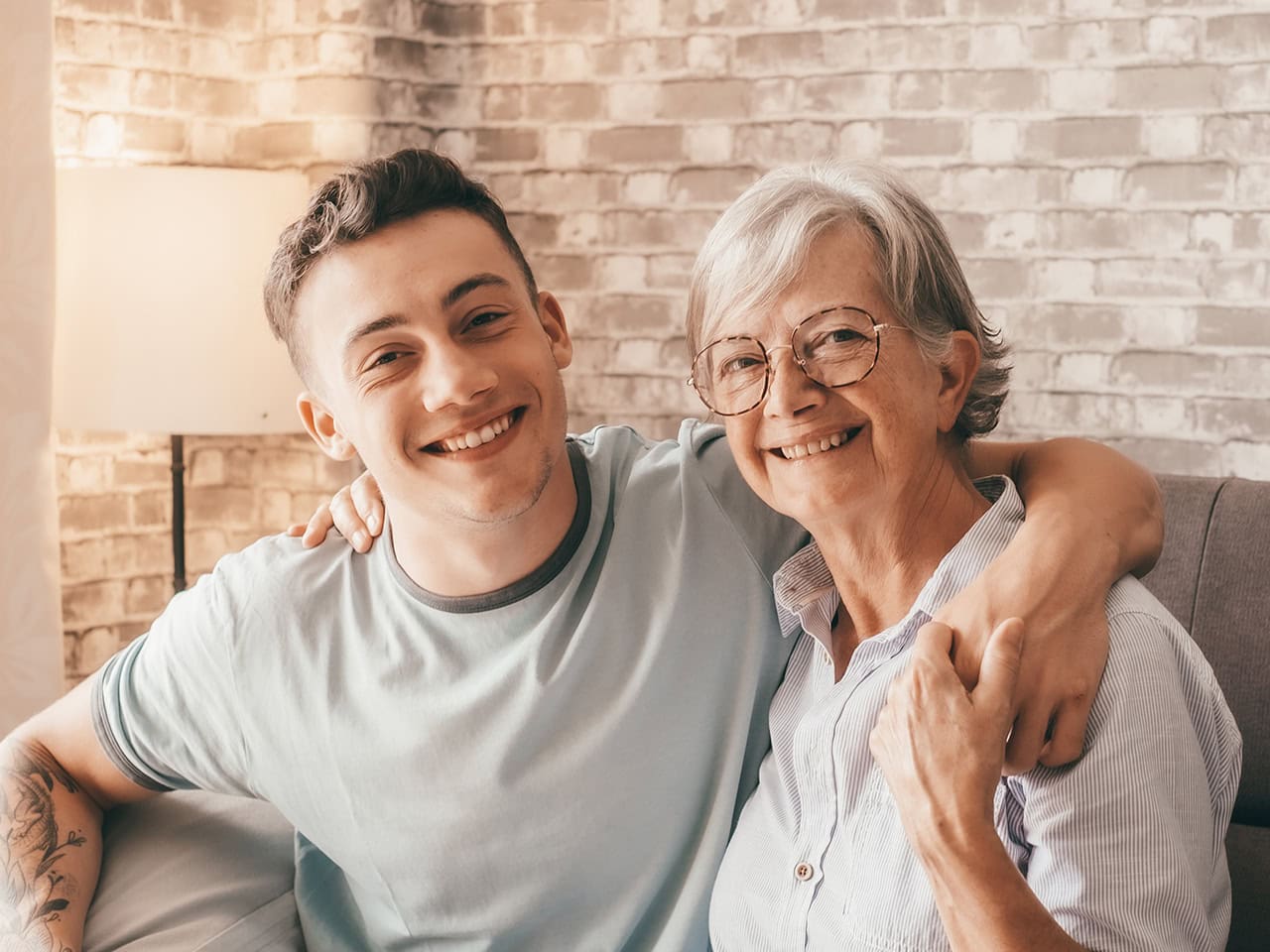 grandmother and grandson smiling