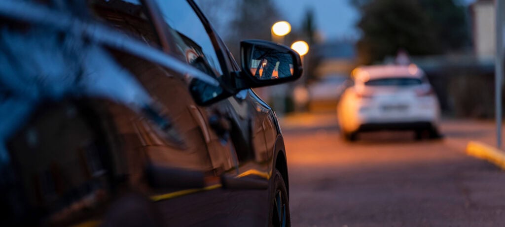 side of the black car at night