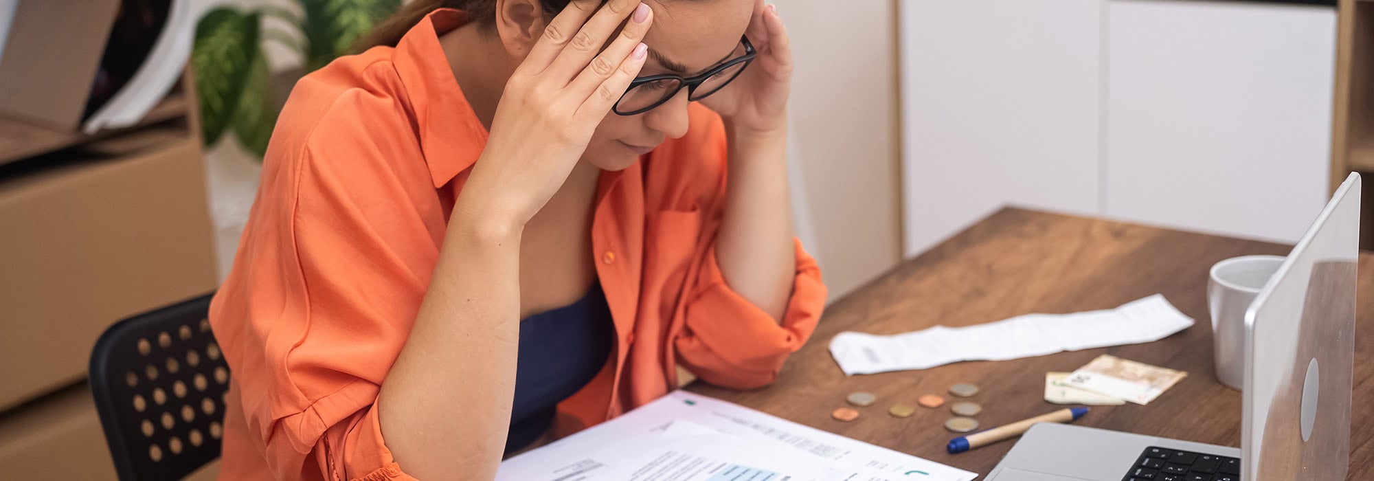 woman stressed over bills