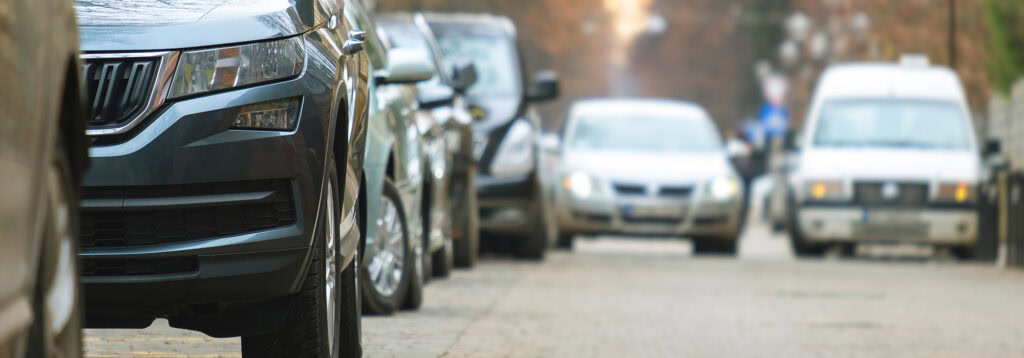 parked cars on the side of a street